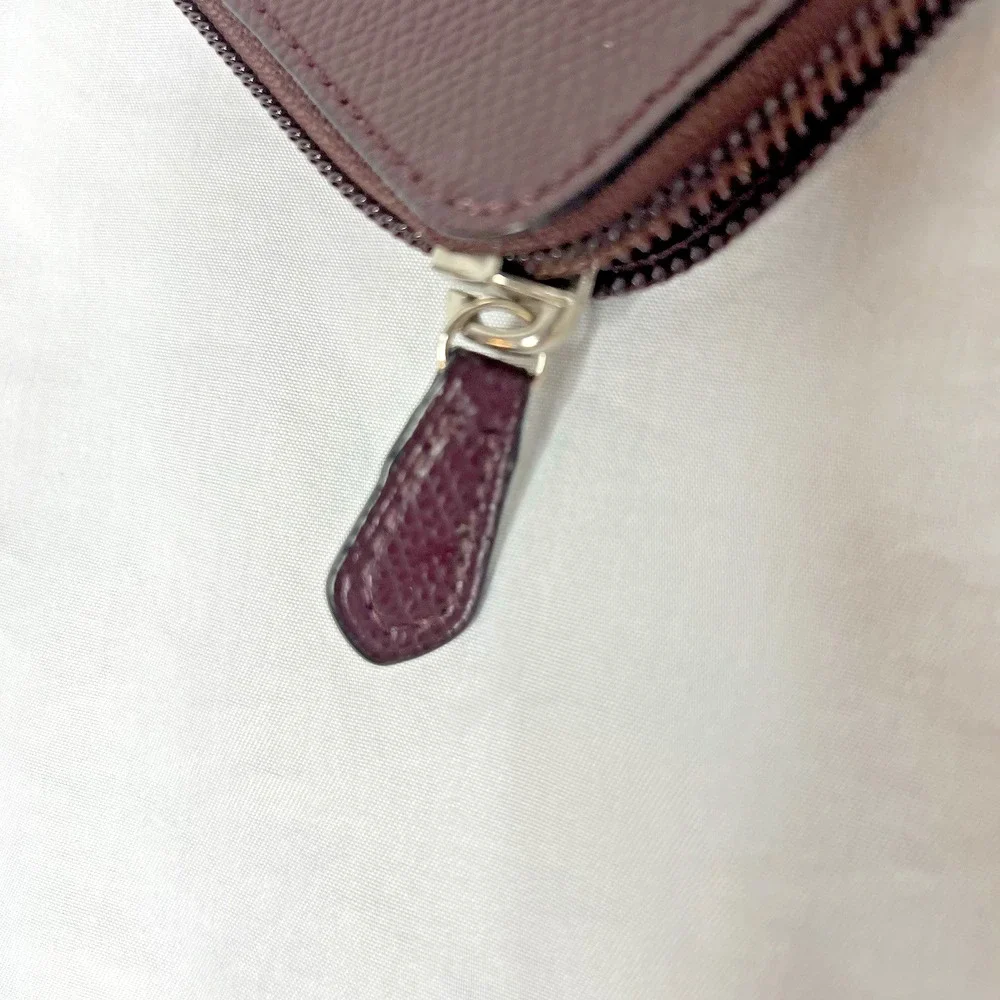 Coach Storypouch Pebbled Leather Zip Clutch Pouch Dark Burgundy Pink Creed Logo‎